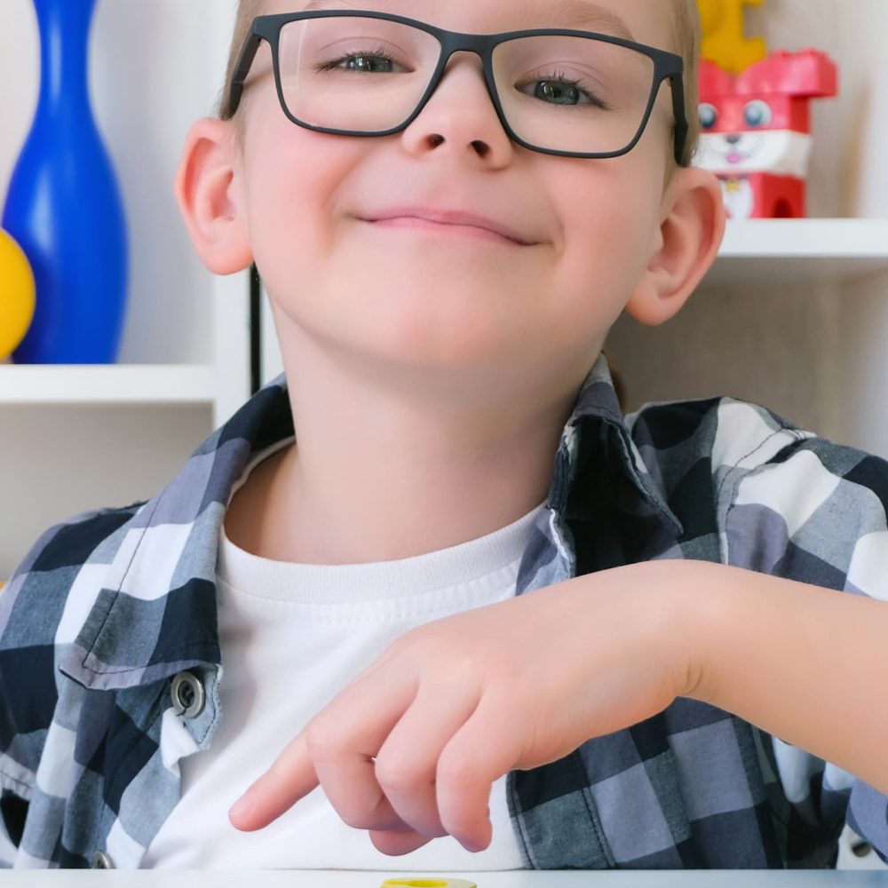 young boy doing speech therapy
